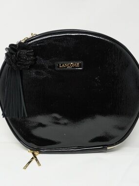 Lancôme Le Parisian Cosmetic Faux Leather Train Case in black. 